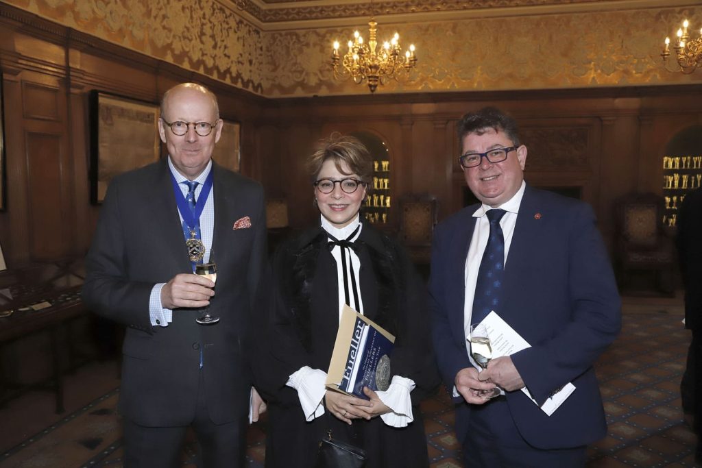 Manahel Thabet receiving the honor of being admitted as a Freeman of the Worshipful Company of Fuellers